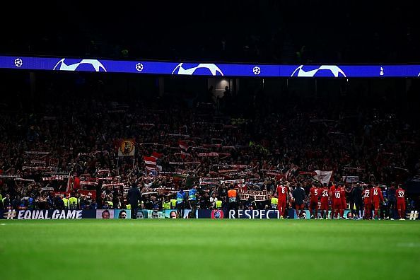 Bayern players celebrate with the raucous travelling support after an unforgettable night's viewing